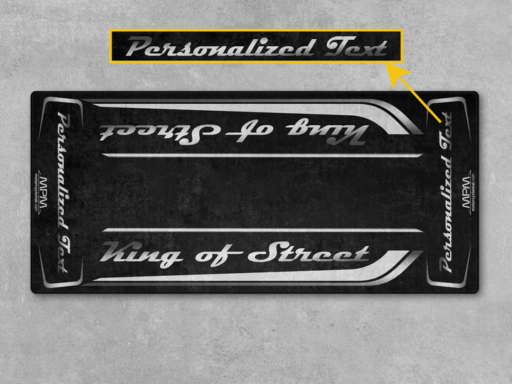 Motorcycle display mat for Harley Street Glide White Onyx Pearl. Durable carpet for garage floor protection and racetrack-inspired styling.