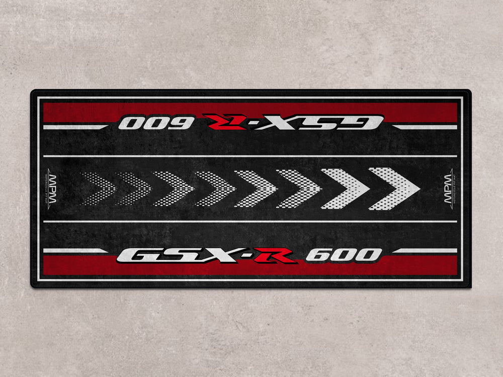 GSX-R600 pit mat with red accents for bike zone and motorcycle gear setups. Ideal for racetrack and superbike garage.