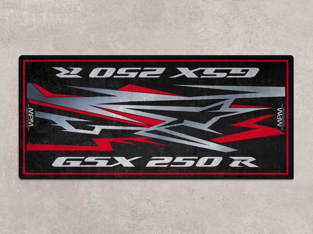 GSX250R motorcycle display pit mat. Bold red floor cover for superbike garage, racetrack setup, or accessory zone.