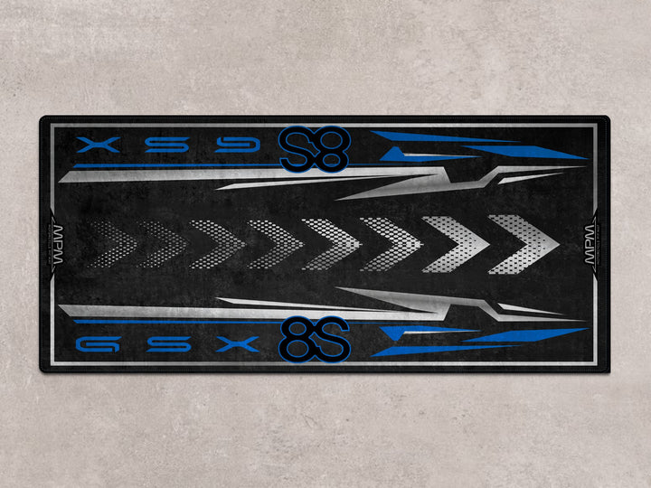 GSX-8S pit mat in black and blue. Premium motorcycle rug for parking mat setups, bike zone, and track prep areas.