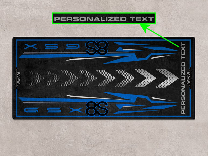 Garage pit mat for GSX-8S in blue. Custom pit rug for racetrack use, rider essentials, and motorcycle gear station.