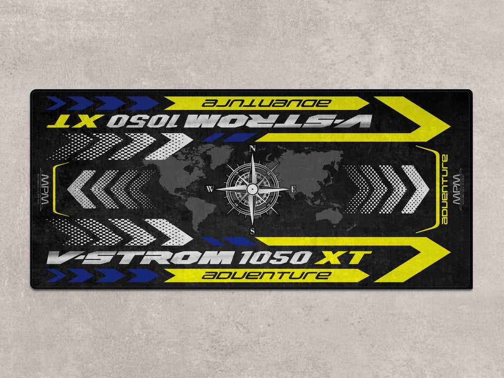 V-Strom 1050 XT adventure bike showcased on Thermoplastic Rubber pit mat. Rug for parking or racetrack.