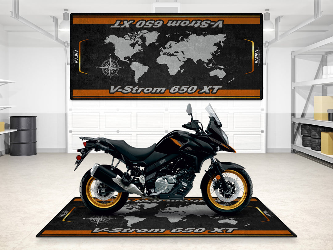 Suzuki V-Strom 650 XT in Glass Sparkle Black parked on garage floor cover. Essential accessory for riders.