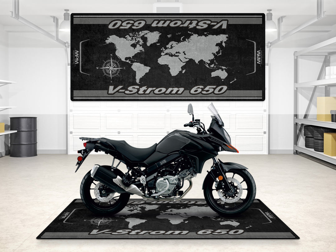 Suzuki V-Strom 650 in Solid Iron Gray displayed on a premium garage mat. Ideal for parking and floor cover.