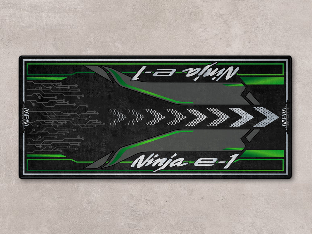 Electric-style floor cover for Ninja e-1 with Thermoplastic Rubber base, perfect rug for garage and showroom setups.