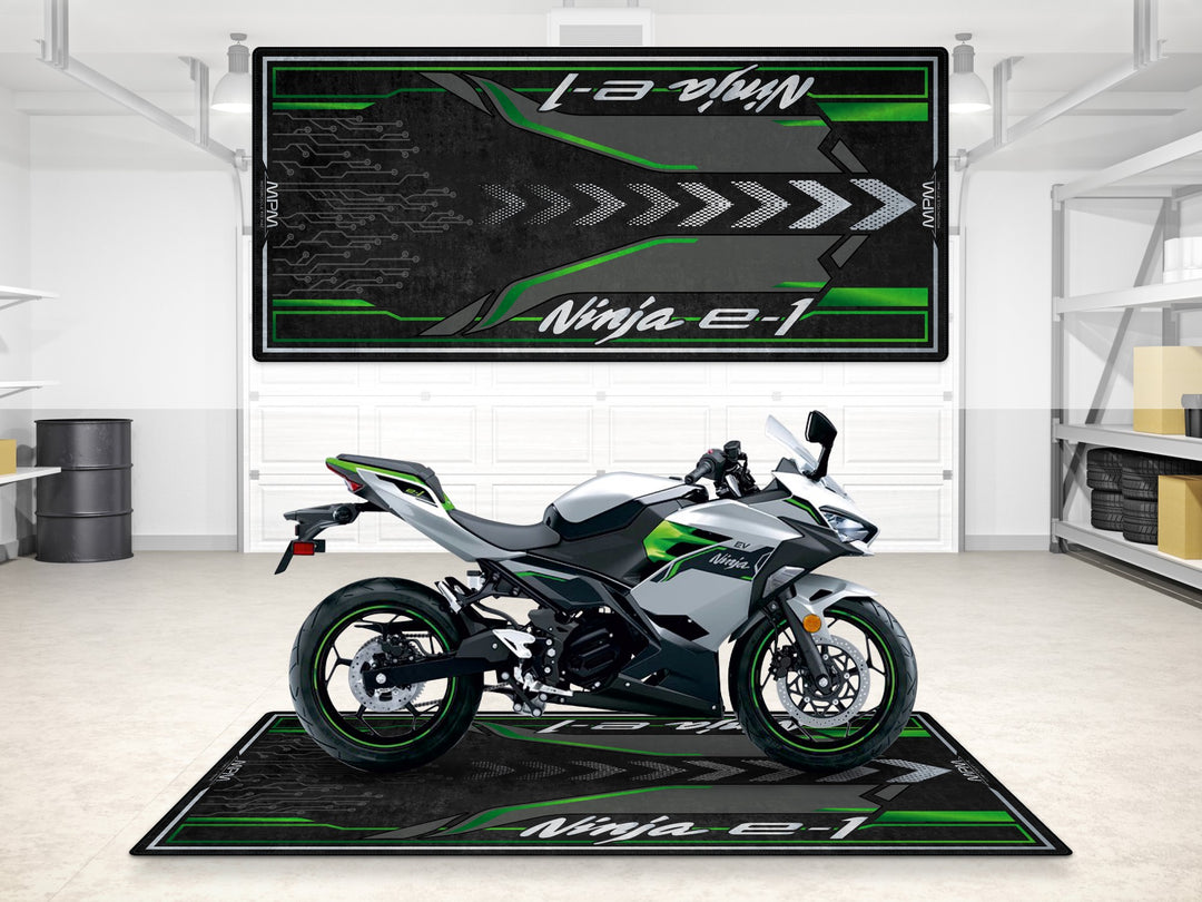 Ninja e-1 garage mat in bright silver and lime green with circuit lines, ideal for parking, track prep and display.