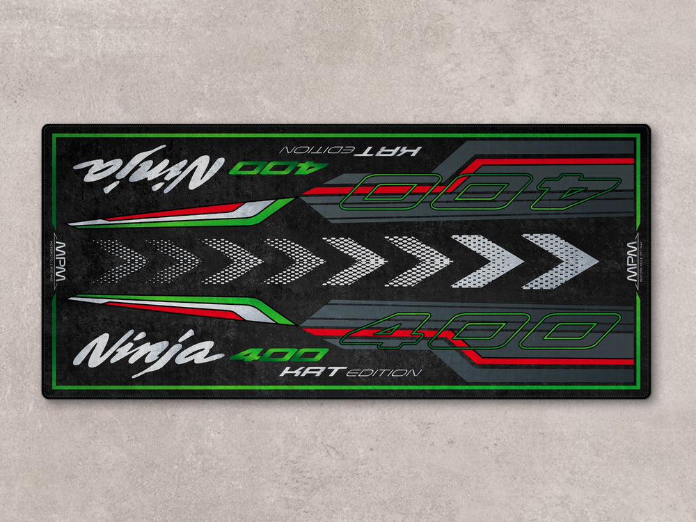 Motorcycle floor cover for Ninja 400 with Thermoplastic Rubber base, ideal rug for garage and showroom setups.