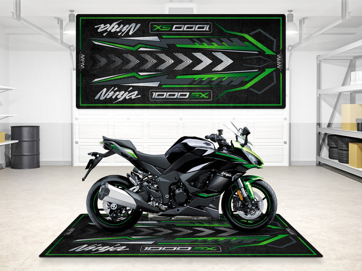 Ninja 1000SX garage mat in emerald green tones with arrow pattern, perfect for pit mat and racetrack prep use.