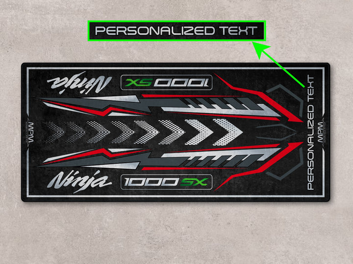 Personalized parking mat in graphite red theme, a gift-worthy accessory for superbike garage and racetrack use.