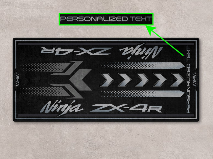 Personalized parking mat for ZX-4R in matte black tones, ideal for superbike garage and racetrack preparation.