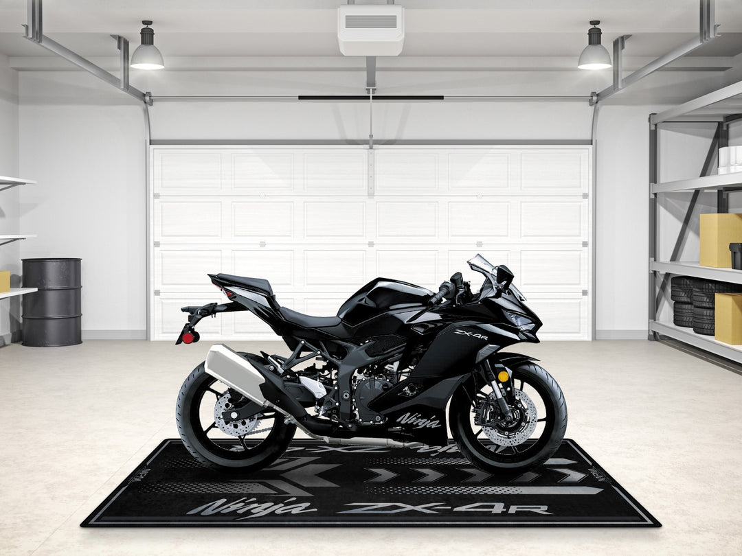 Metallic spark black ZX-4R pit rug, a gift-worthy carpet for showroom setups and garage floor protection.