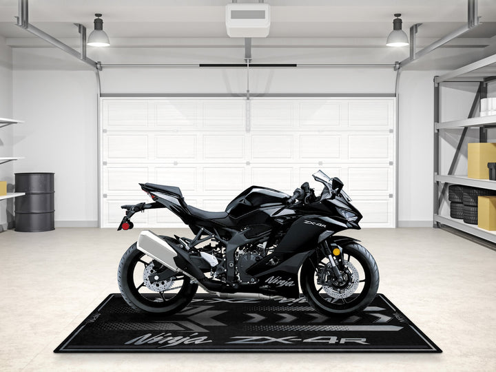Metallic spark black ZX-4R pit rug, a gift-worthy carpet for showroom setups and garage floor protection.