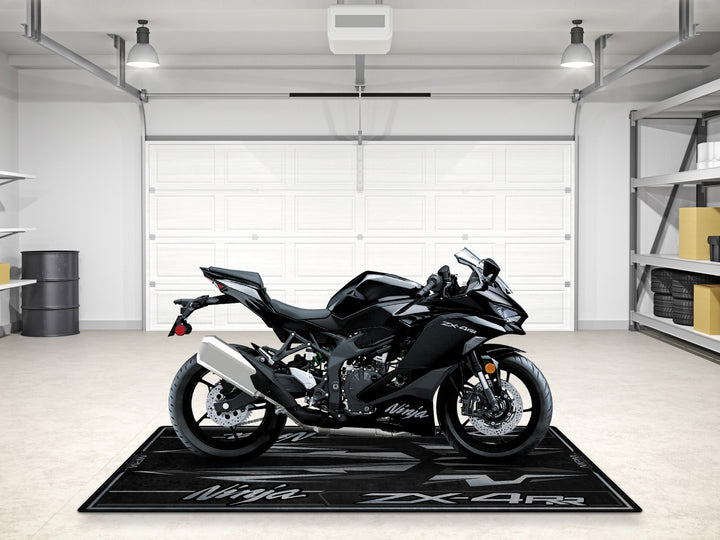 Spark black ZX-4RR pit mat, a gift-worthy carpet for motorcycle display, floor protection and garage style.