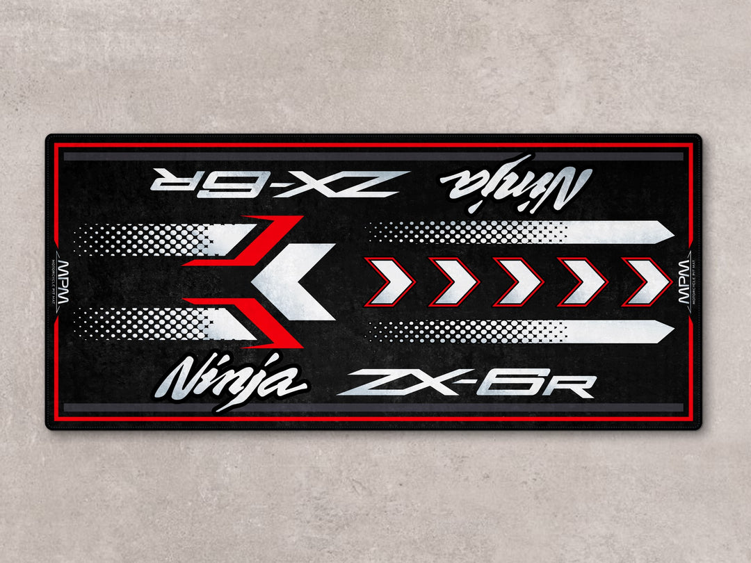 Sporty motorcycle display rug for ZX-6R with Thermoplastic Rubber base, ideal for garage floor protection.
