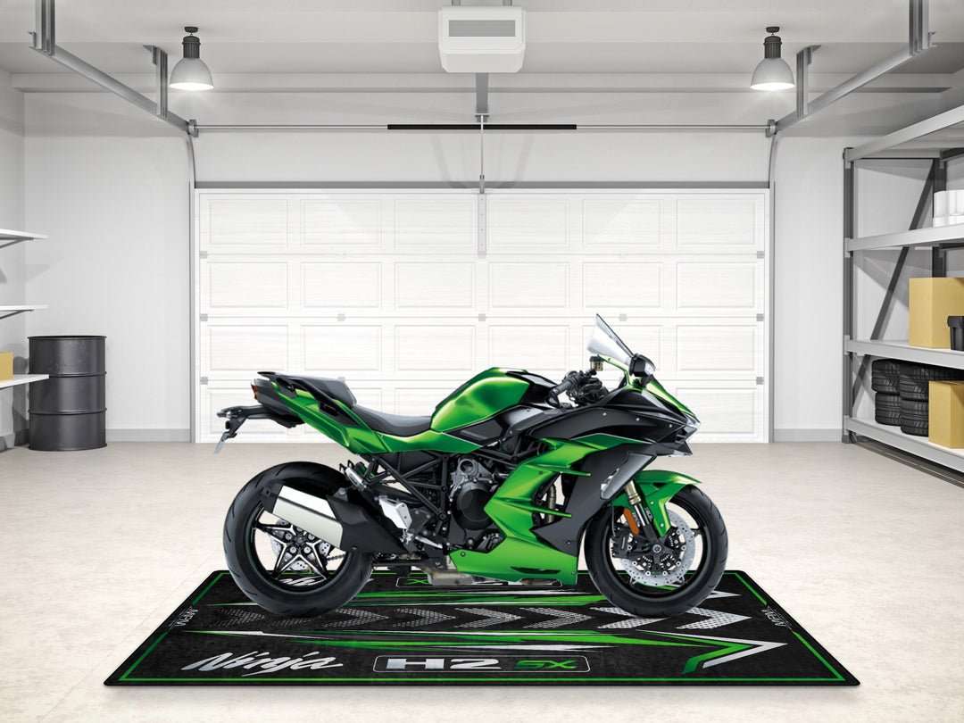 Superbike garage mat in metallic green. A stylish floor cover and carpet for track prep, racetrack, and motorcycle accessory setups.
