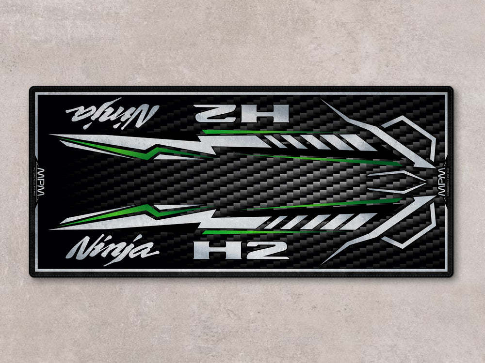 Ninja H2 parking mat with candy green streaks. Ideal showroom rug or racetrack prep floor cover for motorcycle display.