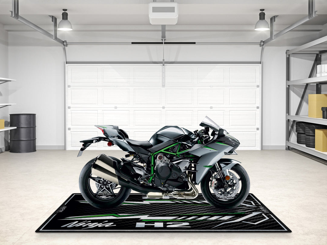 Green-accented floor rug for Ninja H2. Durable pit mat made for track prep, parking mat use, or bold motorcycle showroom looks.