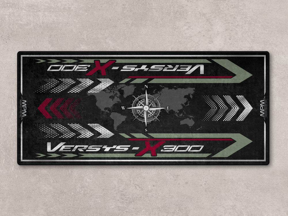 Motorcycle pit mat for Versys-X 300 riders. Durable parking rug crafted from Thermoplastic Rubber for racetrack and track prep zones.