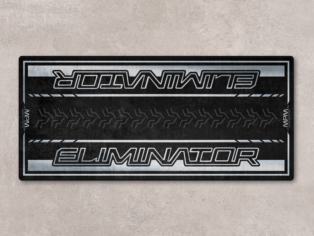 Garage parking mat for Eliminator riders. Durable floor cover and stylish carpet for racetrack prep and everyday bike zone use.