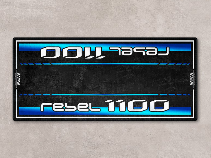 Durable Thermoplastic Rubber motorcycle rug for Rebel 1100. Ideal for use as a showroom accessory or garage mat.