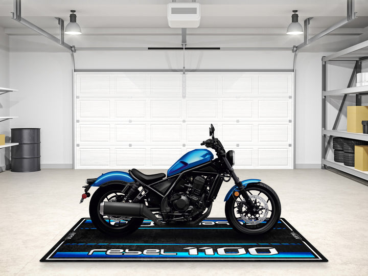 Honda Rebel 1100 garage floor cover in metallic blue. Great motorcycle parking mat and rider essentials decor piece.