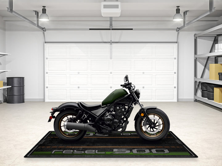 Matte green Rebel 500 rug with Thermoplastic Rubber base. Bike zone essential for parking, display, and racetrack use.
