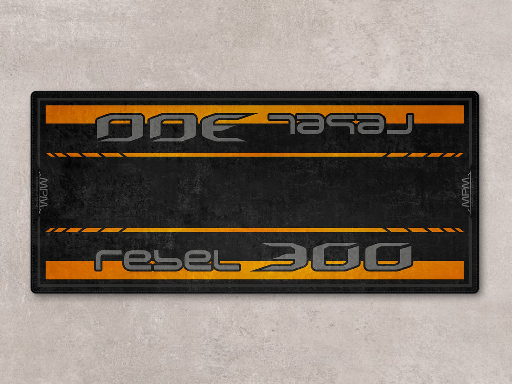 Nitric Orange pit mat for Rebel 300. Thermoplastic Rubber base provides garage floor protection and anti-slip safety.