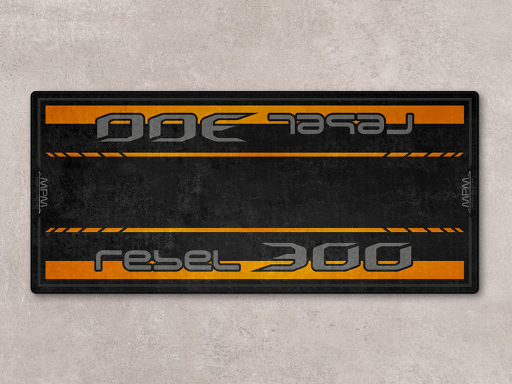 Nitric Orange pit mat for Rebel 300. Thermoplastic Rubber base provides garage floor protection and anti-slip safety.