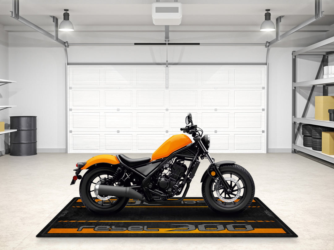 Motorcycle mat for Rebel 300 in Nitric Orange. Pit mat style carpet ideal for parts zone and bike maintenance area.
