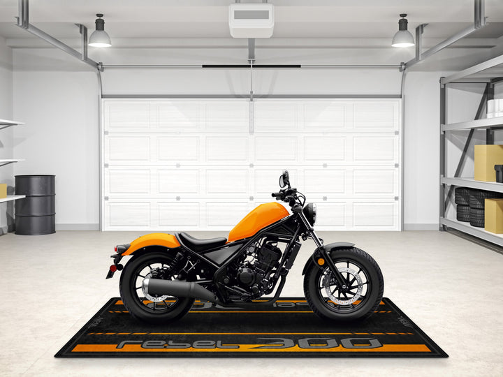 Motorcycle mat for Rebel 300 in Nitric Orange. Pit mat style carpet ideal for parts zone and bike maintenance area.