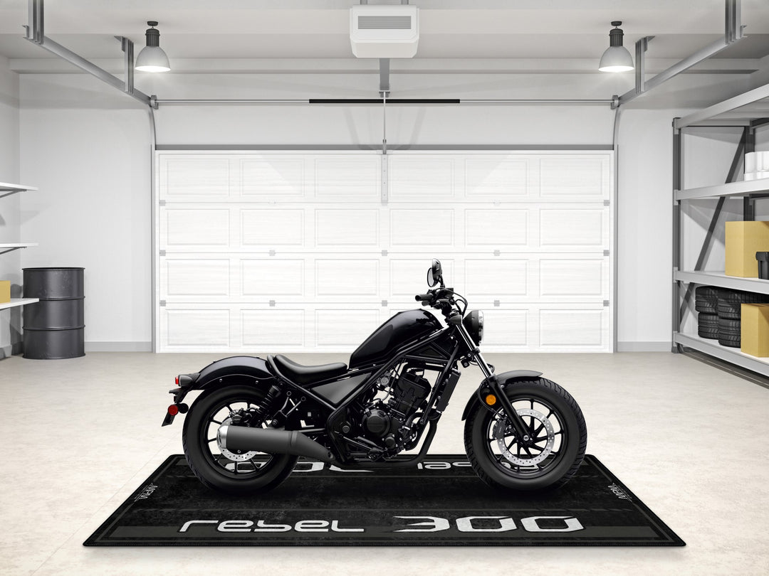 Motorcycle pit mat for Rebel 300 in Pearl Black. A premium floor rug for racetrack, bike zone, or accessory corner.