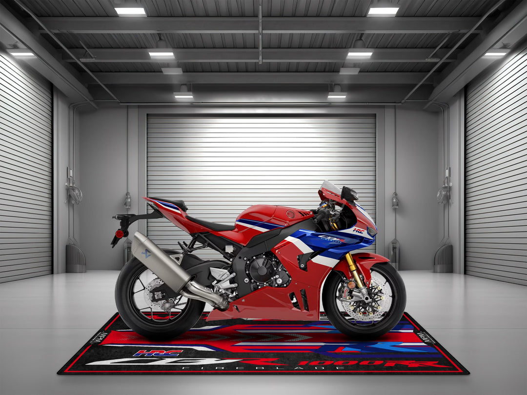Turn your garage into a racetrack with this Fireblade SP garage mat. A premium rug built for motorcycle display and track prep perfection.