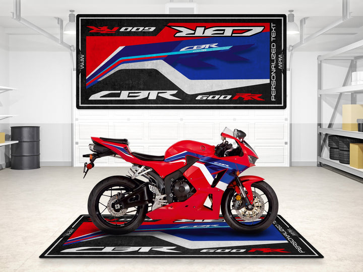 Custom pit rug designed for Honda CBR600RR. A stylish motorcycle display carpet for superbike garage or track prep station.