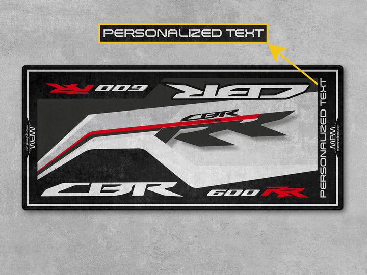 Personalized garage mat designed for Honda CBR600RR. Great gift and accessory for bike zone, showroom, or track prep setup.