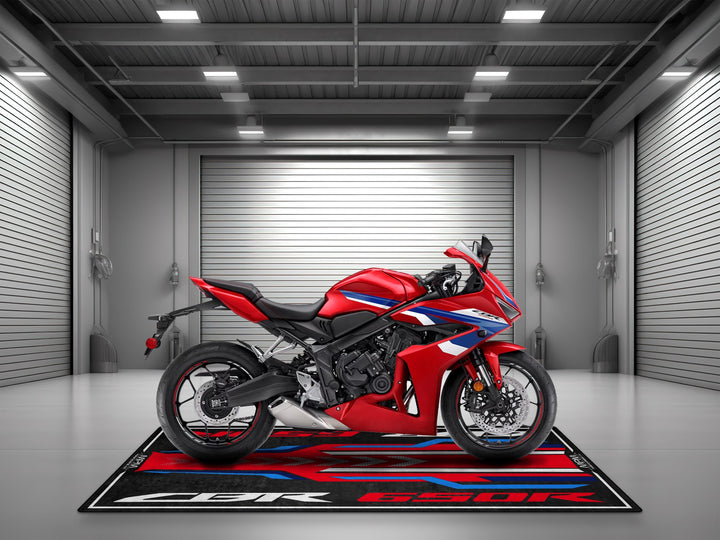 Let your Grand Prix Red CBR650R shine on this custom rug. Rider essentials meet style in this perfect parking mat upgrade.