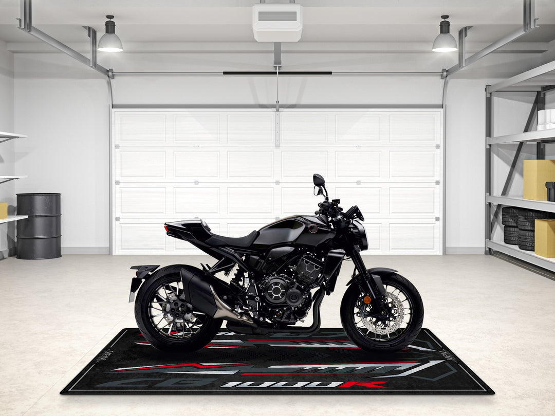 Upgrade your space with this CB1000R Black Edition garage mat. A bold pit rug for style, protection, and motorcycle display.