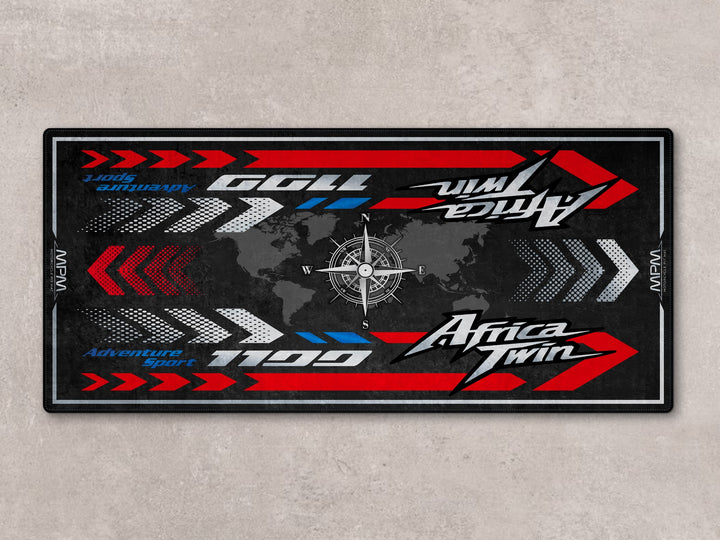 Adventure-ready pit mat for Africa Twin. Premium floor cover for showroom display, racetrack setup, or motorcycle gear zone.