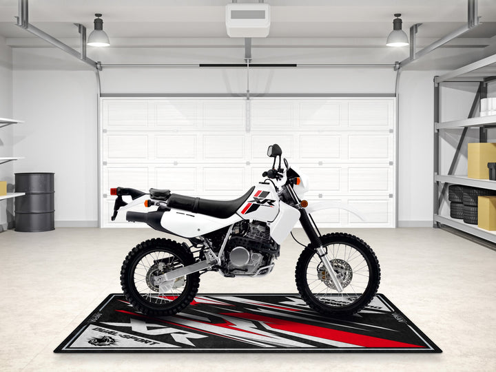 Garage mat for Honda XR650 dual sport. Durable Thermoplastic Rubber base for parking, protection, and display.