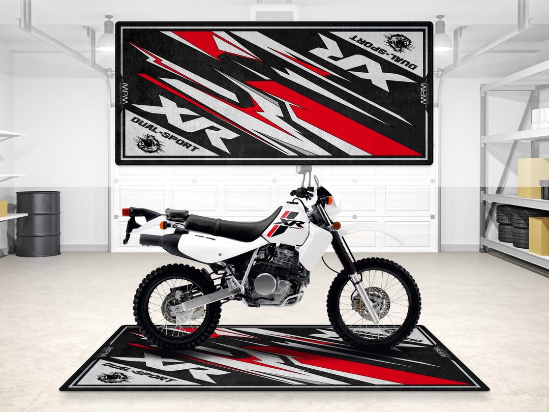 White Honda XR650 parking mat. Rugged garage mat for garage floor protection and off-road motorcycle gear setups.