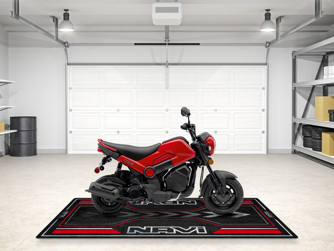Red Honda Navi pit mat for bike zone or racetrack use. Rug-style garage floor cover for motorcycle display setups.