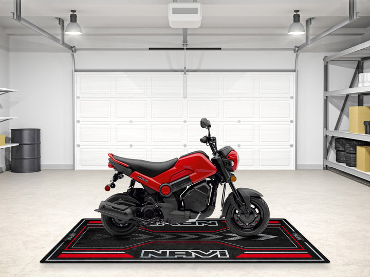 Red Honda Navi pit mat for bike zone or racetrack use. Rug-style garage floor cover for motorcycle display setups.