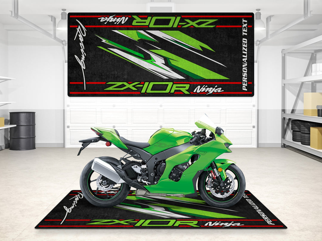 Custom pit rug for Kawasaki ZX-10R, red-lined carpet for motorcycle display, rider gear, and accessories.
