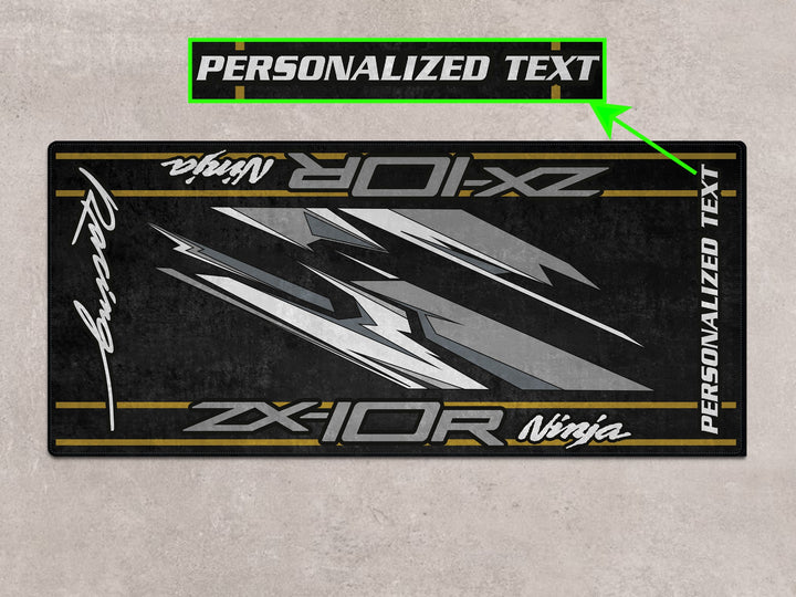 Personalized ZX-10R motorcycle gear mat with Thermoplastic Rubber base for garage floor protection.