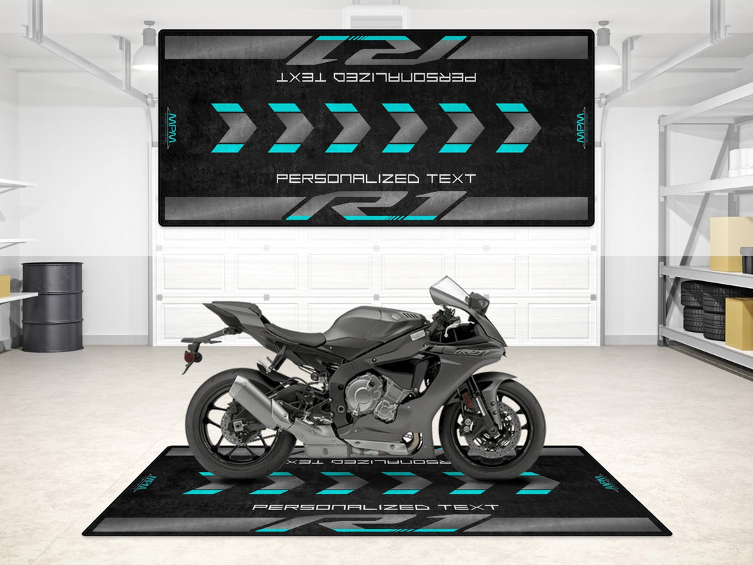 Custom pit mat in black and aqua for Yamaha R1, a unique gift and racetrack display accessory.