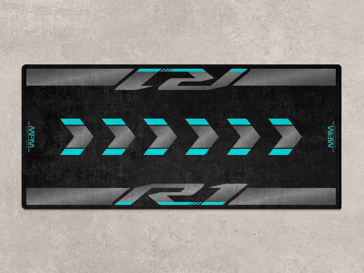 Floor cover rug for Yamaha R1, perfect parking mat for motorcycle gear and rider essentials.