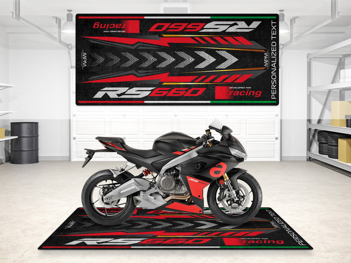 Turn your superbike garage into a track prep zone with this Aprilia RS 660 carpet mat. Built for durability, with Thermoplastic Rubber and garage floor protection.