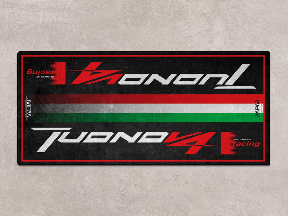 Aprilia Tuono V4 motorcycle rug. Garage carpet and parking pad for sport naked riders who seek style, parts protection, and bold presentation.