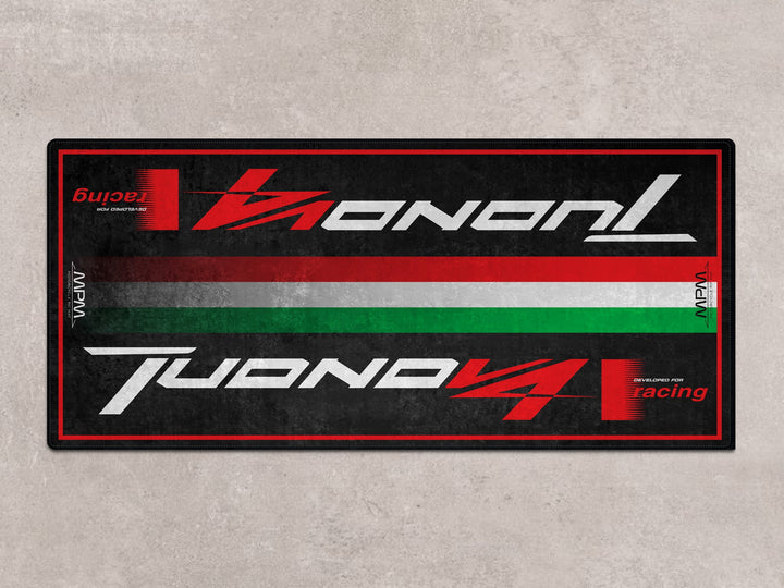 Aprilia Tuono V4 motorcycle rug. Garage carpet and parking pad for sport naked riders who seek style, parts protection, and bold presentation.