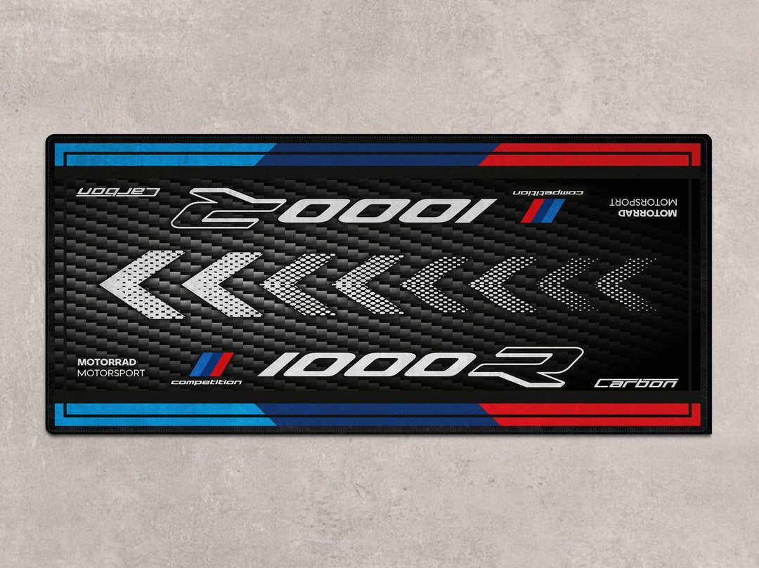BMW M1000R Black Storm Metallic parking mat and rug. Ideal motorcycle gear for showroom displays, garages, or trackday paddocks.