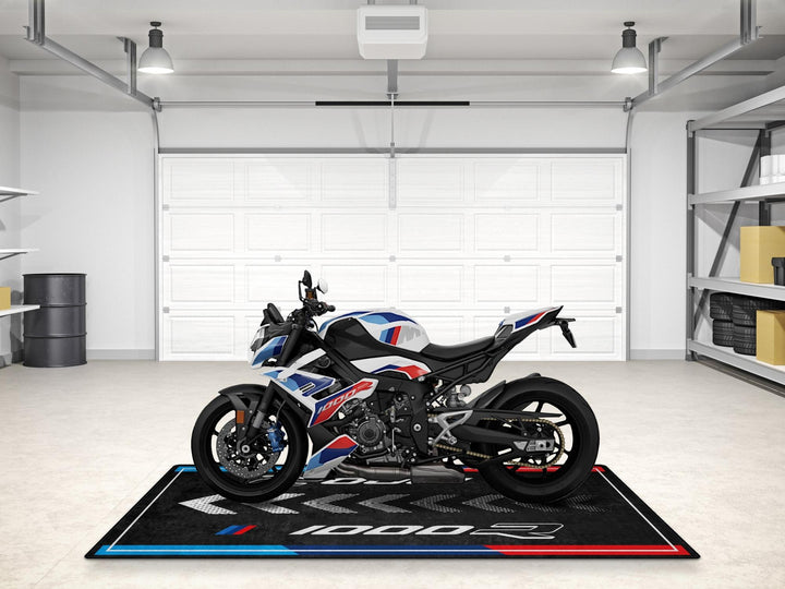 Light White M1000R garage mat with M Motorsport look, perfect pit mat, rug, or floor cover for superbike display and showroom setup.